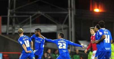 Piquionne (second from left): Celebrates his debut strike for Rovers